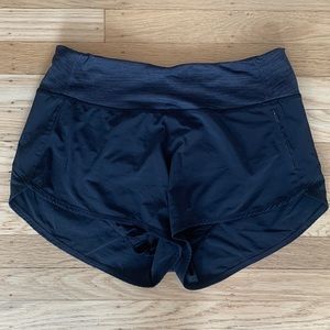 Outdoor Voices running shorts in black/ grey